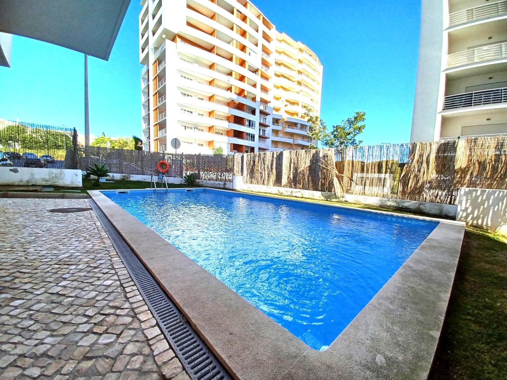 Edificio Lumina Sunshine Beach Apartment بورتيماو المظهر الخارجي الصورة