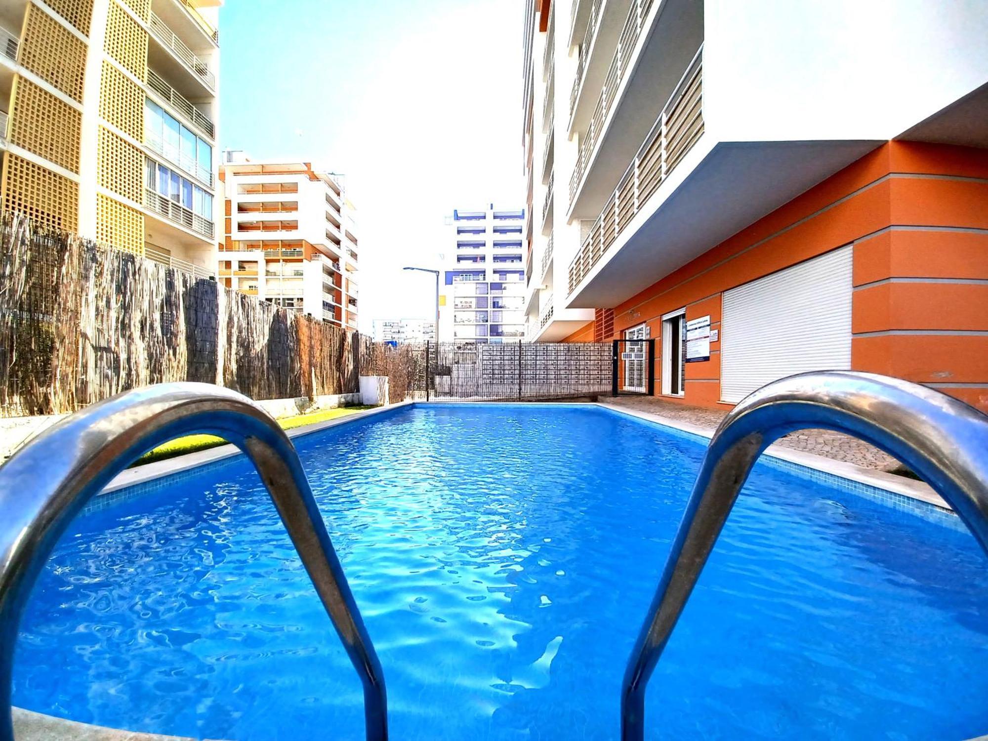 Edificio Lumina Sunshine Beach Apartment بورتيماو المظهر الخارجي الصورة